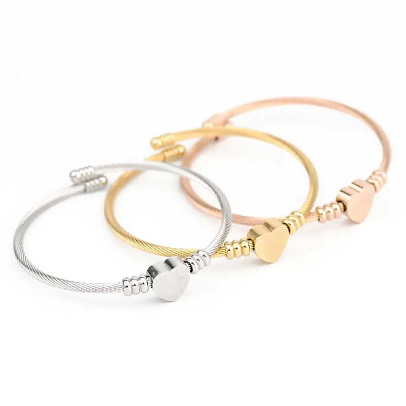 Aurelia™ Gold Heart Seal Bangle